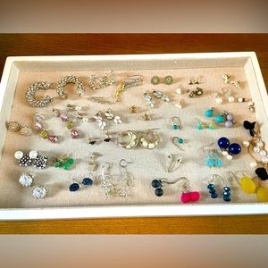 Huge load of earrings, gold, silver, sparkly. Several never work. Jewelmint. Etc